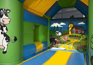 Springkussen Boerderij Glijbaan - www.springkussen-huren-utrecht.nl
